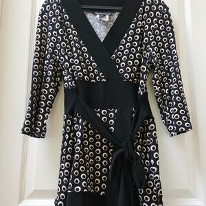 CANADA's own Frank Lyman top.  Size 12